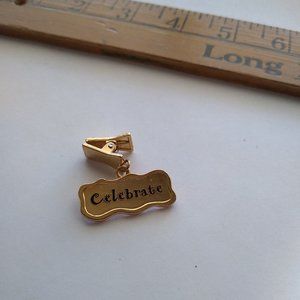 Celebrate gold tone clip on emotion pin